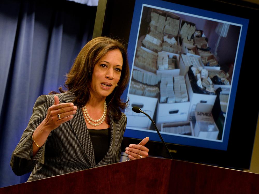 Then-California Attorney General Kamala Harris briefs the media after raids on money laundering operations in  Los Angeles on Sept. 10, 2014.