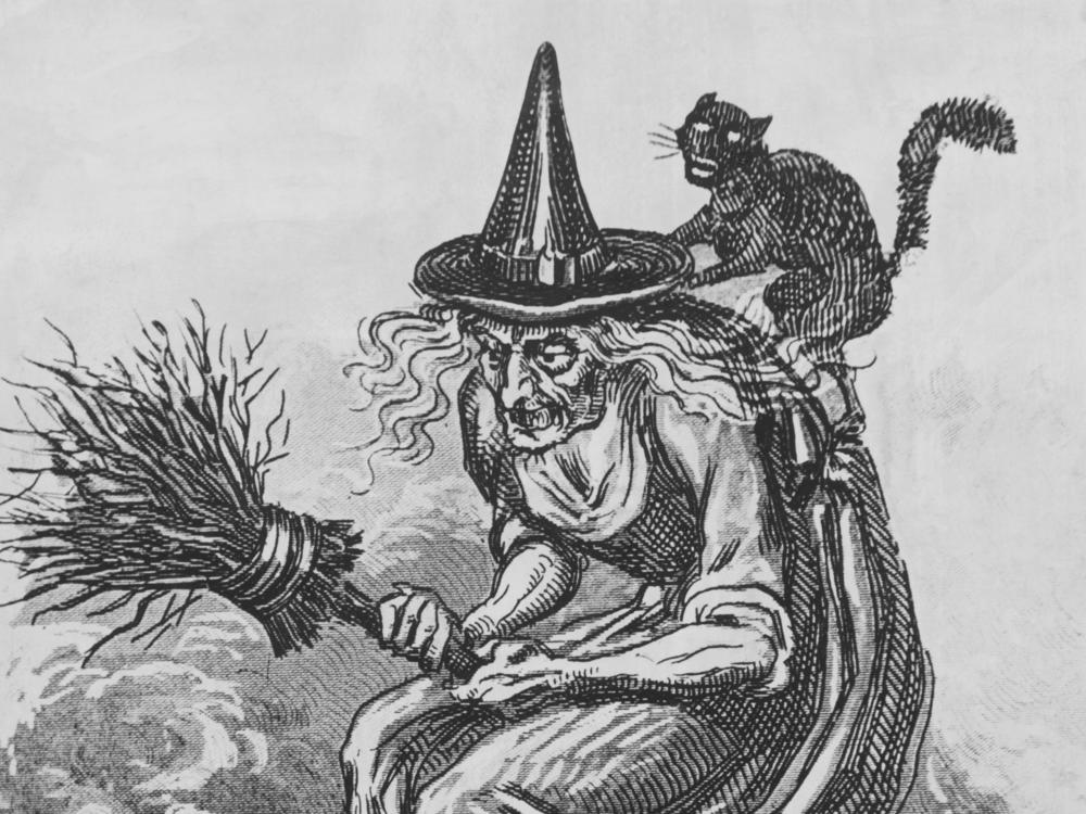 An undated engraving showing a witch and a cat on a broom, from the middle of the 15th century.  