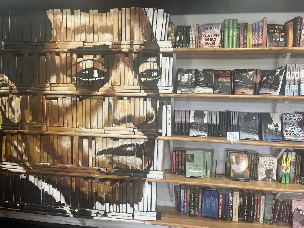  James Baldwin's face is painted on a decorative bookcase inside the Baldwin & Co. bookstore in New Orleans.