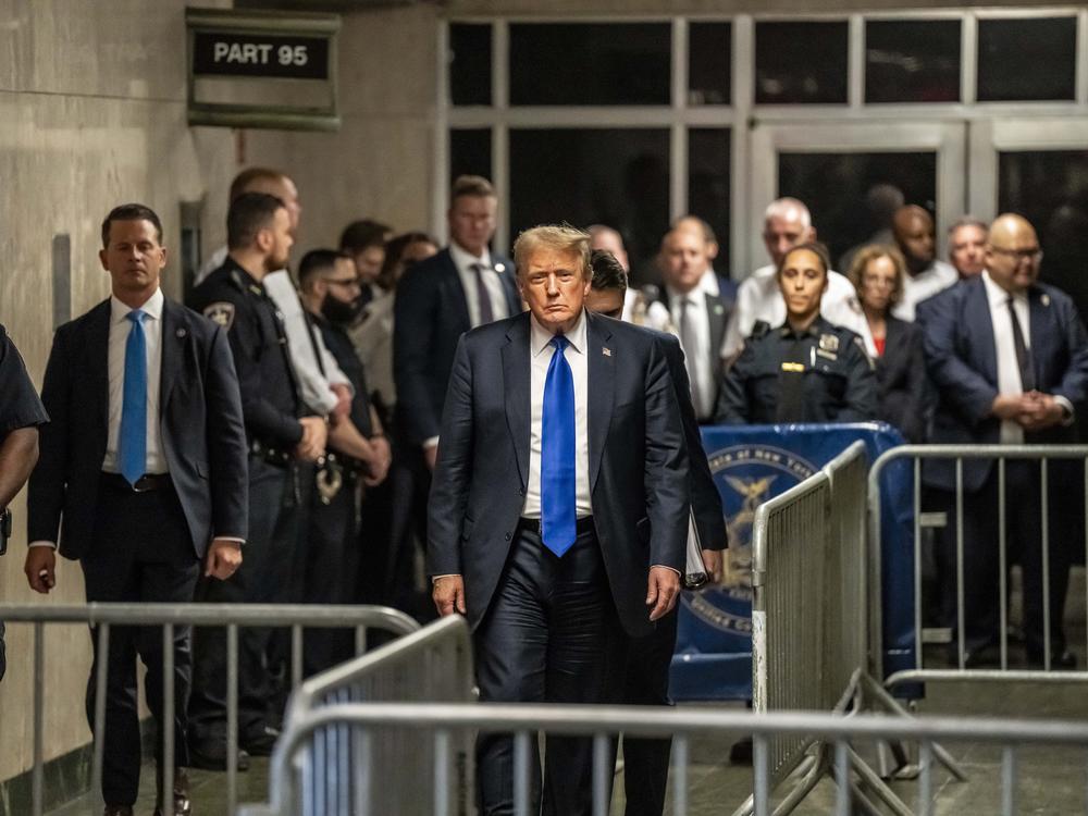 Former President Donald Trump leaves the courthouse after he was found guilty in his hush money trial at Manhattan Criminal Court on May 30, 2024.