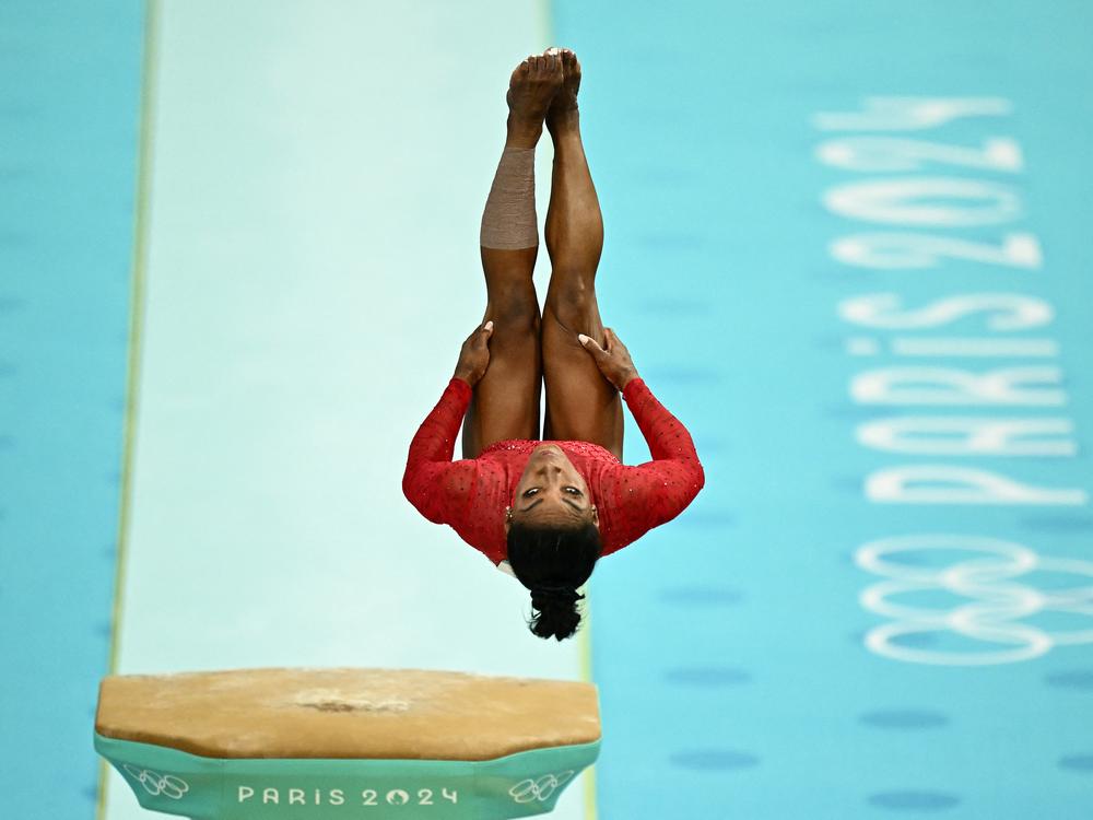 Simone Biles performs her signature 'Yurchenko double pike' to win gold in the gymnastics women's vault final during the Paris 2024 Olympic Games on Saturday at Bercy Arena.