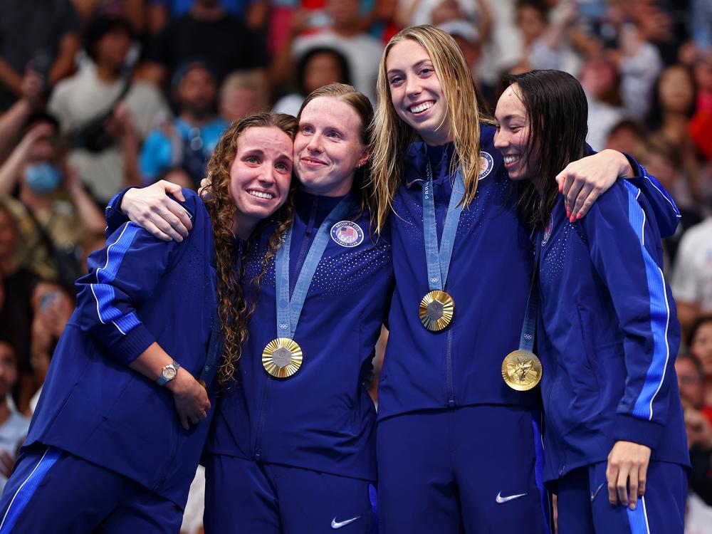 Gold Medalists (from left to right) Regan Smith, Lilly King, Gretchen Walsh and Torri Huske of Team United States celebrate on the podium during the medal ceremony after the Women’s 4x100m Medley Relay Final on Sunday at the Paris Olympics.