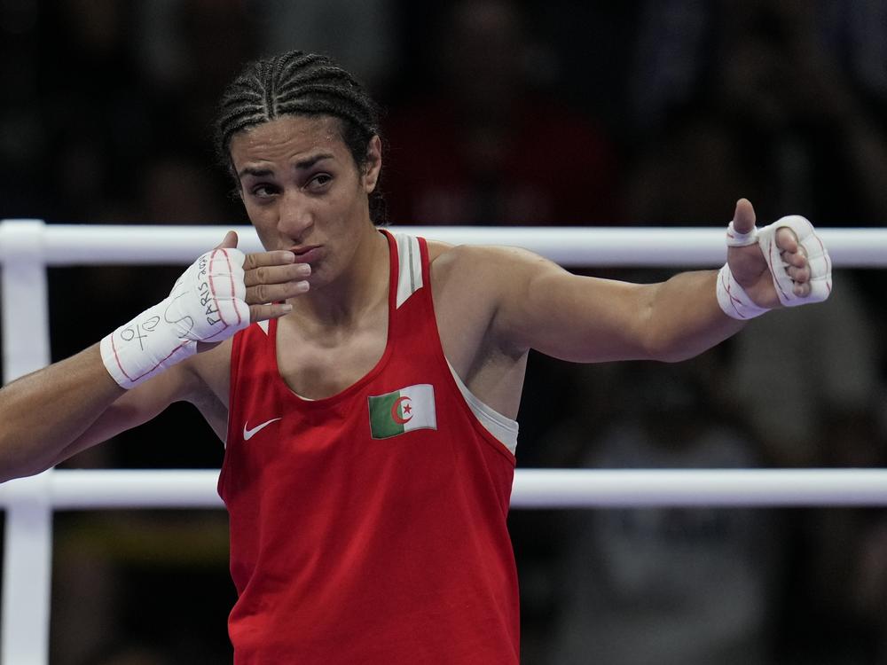 Algeria's Imane Khelif celebrates after defeating Hungary's Anna Hamori in their women's 66kg quarterfinal boxing match on Saturday.