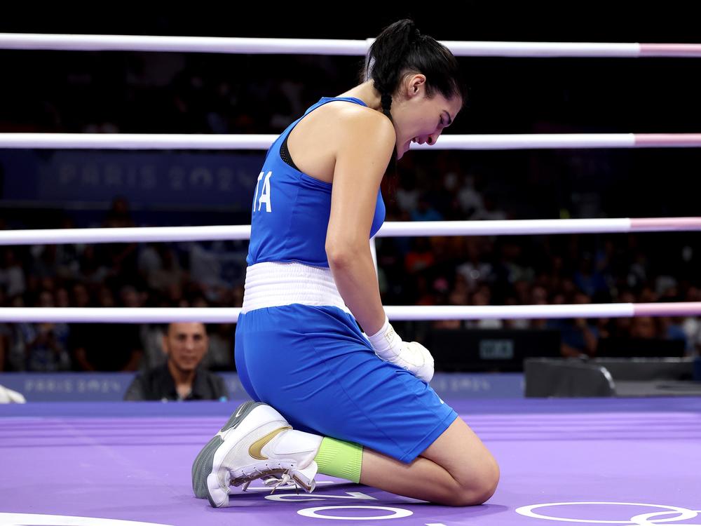 Italy's Angela Carini cries in the ring after abandoning the Women's 66kg preliminary round match against Imane Khelif on Thursday. She has since publicly apologized to Khelif.