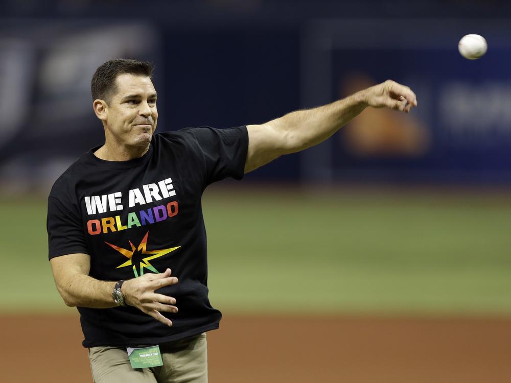 Bill Bean, MLB's vice president of Social Responsibility and Inclusion, throws out the ceremonial first pitch before a baseball game between the Tampa Bay Rays and the San Francisco Giants in 2016 in St. Petersburg, Fla. 