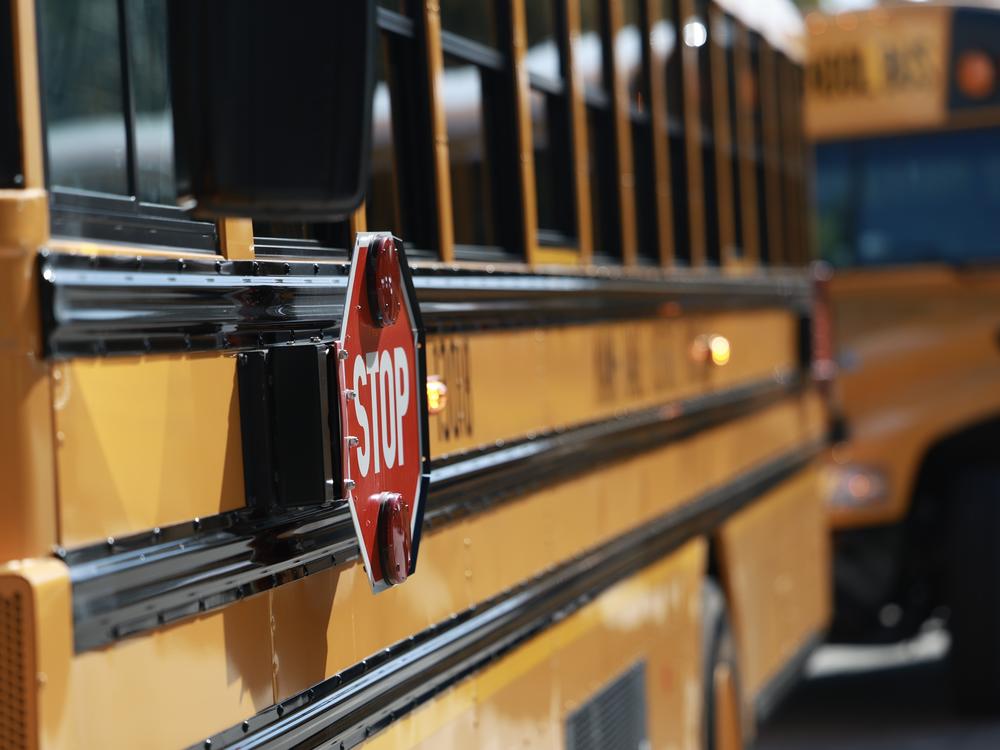 RICHMOND HEIGHTS, FLORIDA - MARCH 11: An electric bus is parked as U.S. Environmental Protection Agency Administrator Michael S. Regan visits during an event to highlight funding for electric school buses at the Coral Reef High School on March 11, 2024 in Richmond Heights, Florida. 