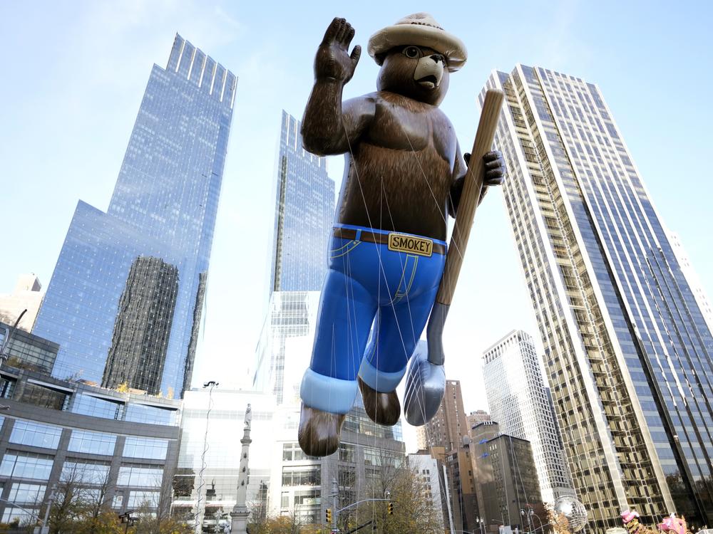 The Smokey Bear balloon floats in the Macy's Thanksgiving Day Parade on Thursday, Nov. 25, 2021, in New York. (Photo by Charles Sykes/Invision/AP)