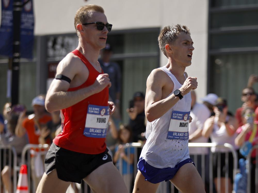 Spurred by faith and friendship, two buddies chase marathon medals in