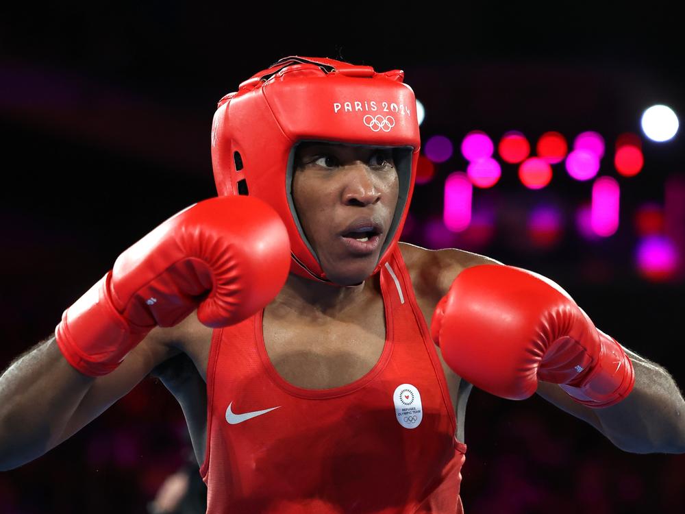 Cindy Ngamba lost in the semifinals but will leave Paris with a bronze medal, a first for the Refugee Olympic Team.