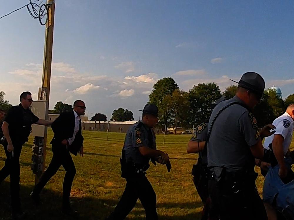 Law enforcement at former President Donald Trump's Butler, Pa., rally on July 13 are captured on body camera footage carrying out one of the wounded victims from the assassination attempt on Trump.