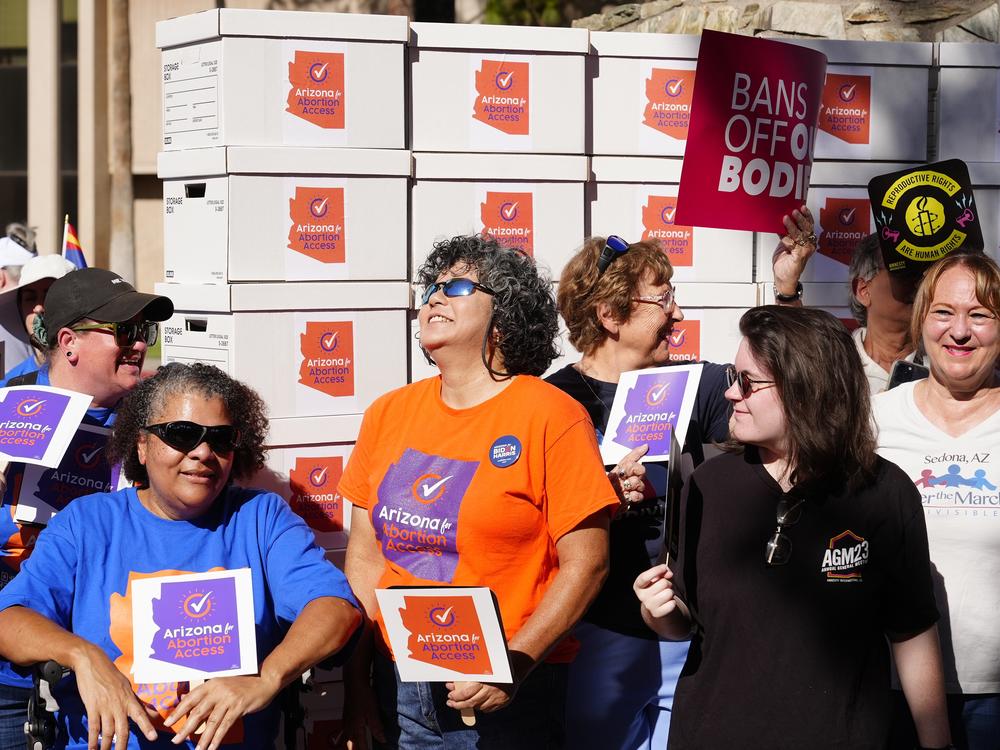 Arizona abortion-rights supporters gather for a news conference prior to delivering more than 800,000 petition signatures to the state Capitol to get abortion rights on the November general election ballot, July 3, 2024, in Phoenix.