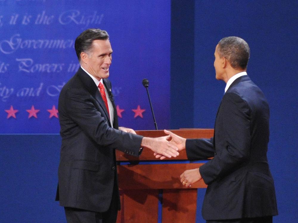 Republican presidential candidate Mitt Romney shakes hands with President Barack Obama on Oct. 3, 2012 after the first presidential debate in Denver, Colorado.