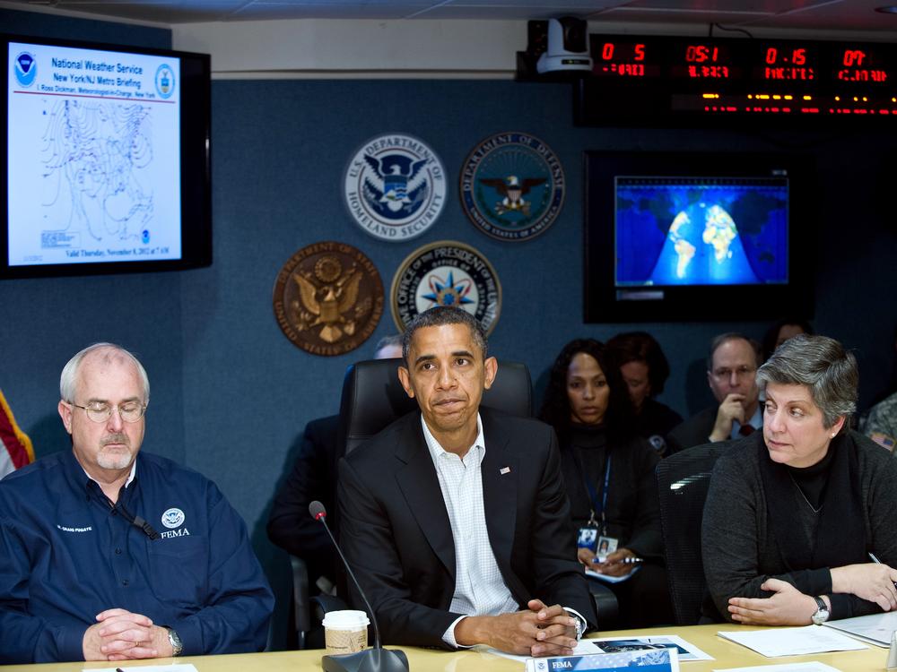 President Barack Obama speaks to the press with FEMA Administrator Craig Fugate and Homeland Security Secretary Janet Napolitano about relief efforts in the aftermath of Superstorm Sandy at FEMA headquarters on Nov. 3, 2012.