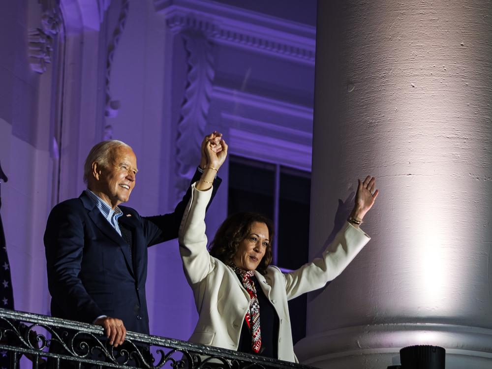 President Biden and Vice President Harris watch the fireworks on the National Mall from the White House balcony on July 4, 2024.