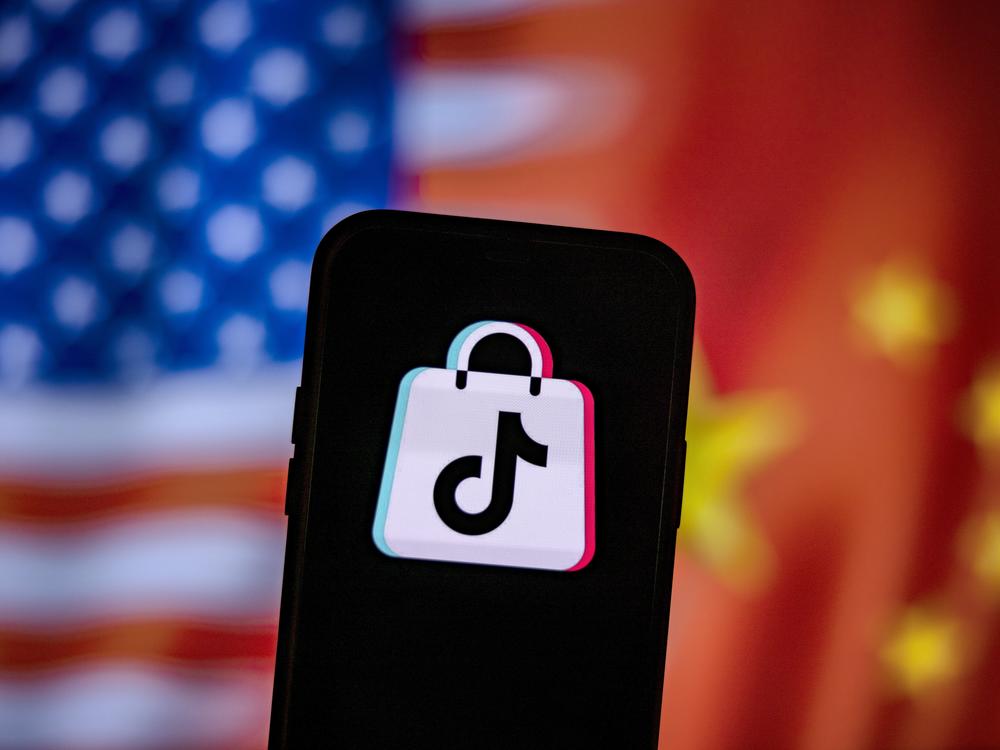 A photo illustration of the TikTok logo next to U.S. and China flags. Researchers have uncovered more accounts tied to a Chinese influence operation known as 