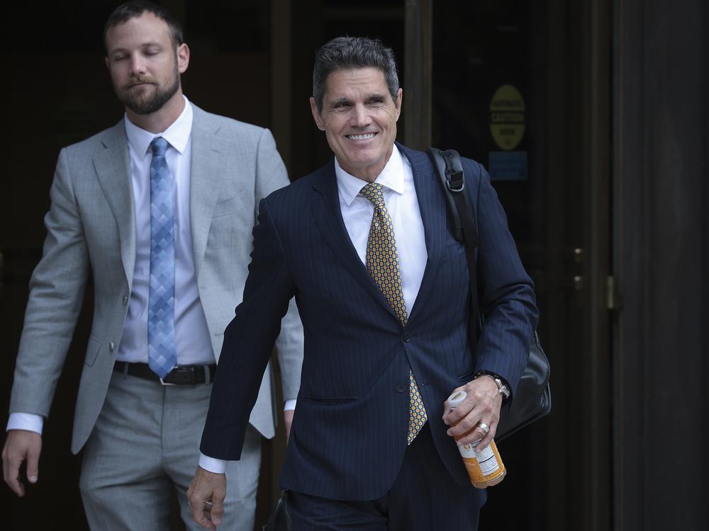 John Lauro (R), an attorney for former President Donald Trump, departs the E. Barrett Prettyman U.S. Court House in 2023.