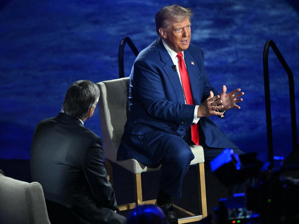 Former president and Republican presidential candidate Donald Trump takes part in a town hall moderated by Fox News broadcaster Sean Hannity at the New Holland Arena in Harrisburg, Pa. on Wednesday.