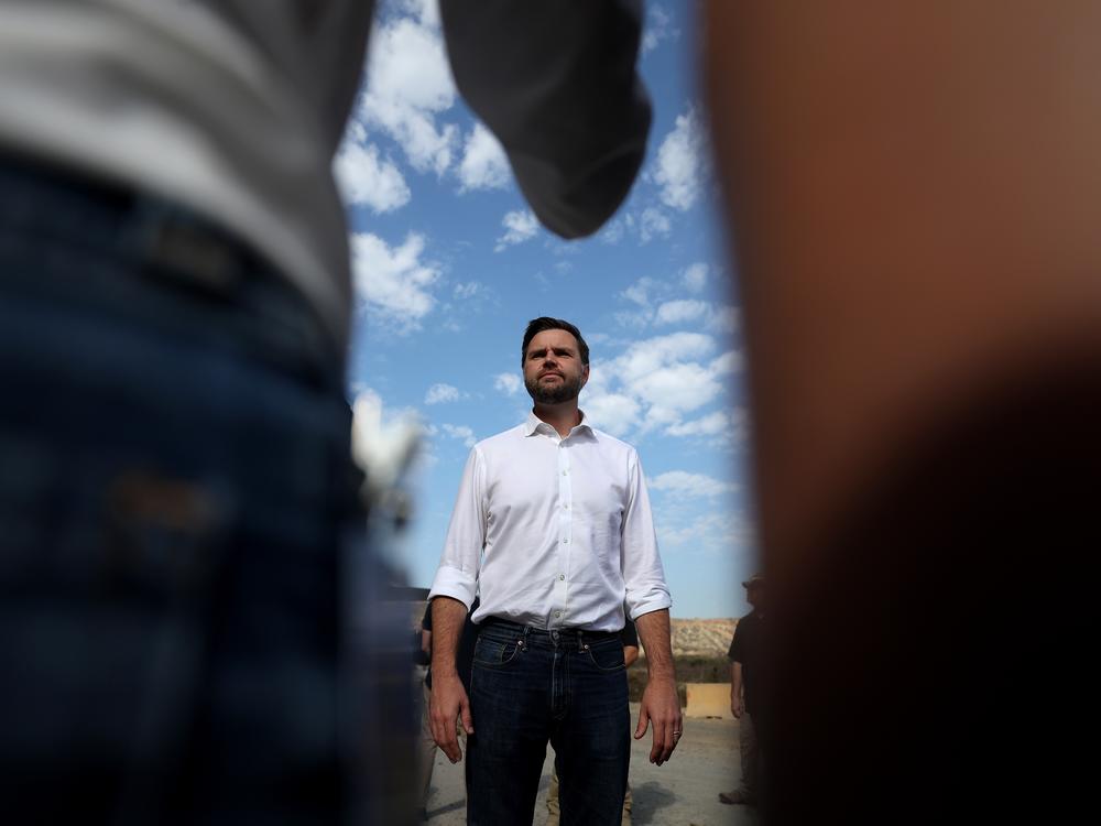 Sen. JD Vance of Ohio, the Republican vice presidential nominee, speaks to reporters in front of the border wall with Mexico on Sept. 6 in San Diego.