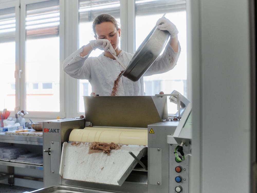 An employee at the testing lab of Planet A Foods tests and processes ChoViva.