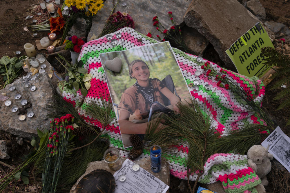 A photo of 26-year-old Tortuguita, who was shot and killed by a Georgia state trooper, is seen on a makeshift memorial in Weelaunee People's Park near Atlanta, Georgia, on Jan. 21, 2023. Photo by Elijah Nouvelage for The Washington Post/via Getty Images