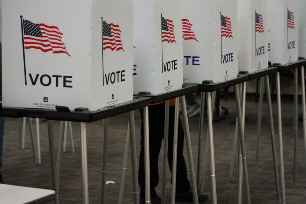 Voting booths are pictured inside the Dona Ana County Government Center during early voting for the upcoming midterm elections in Las Cruces, New Mexico, U.S., October 24, 2022. REUTERS/Paul Ratje