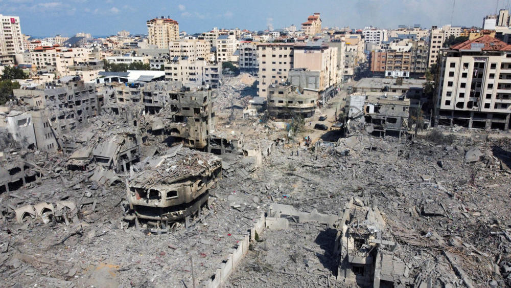 Houses and buildings destroyed by Israeli strikes in Gaza City on Oct. 10, 2023. Photo by Mohammed Salem/ Reuters