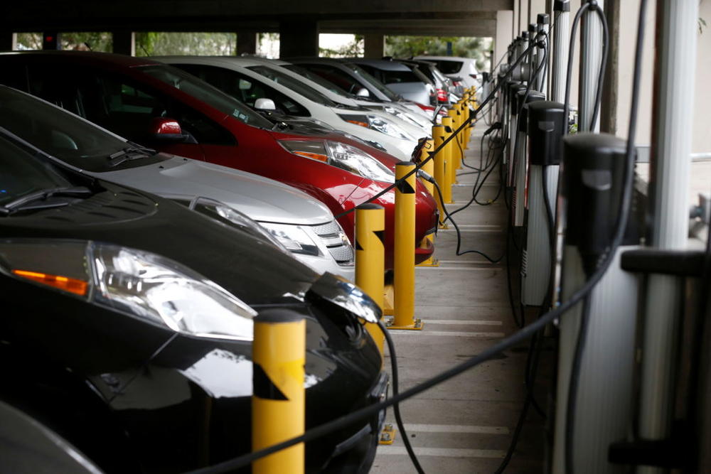 Electric cars sit charging in a parking garage at the University of California, Irvine, in this file photo dated Jan. 26, 2015. Photo by Lucy Nicholson/Reuters