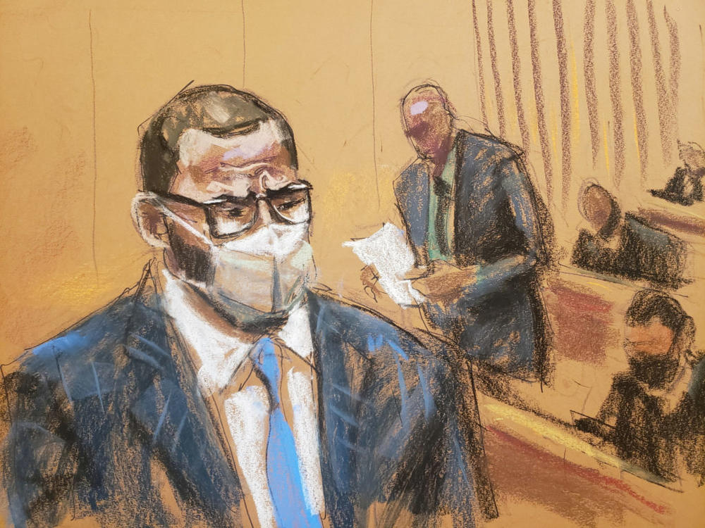 FILE PHOTO: R. Kelly sits as the jury foreman reads the guilty verdict in Kelly's sex abuse trial at Brooklyn's Federal District Court in a courtroom sketch in New York, U.S., Sep. 27, 2021. Jane Rosenberg/REUTERS
