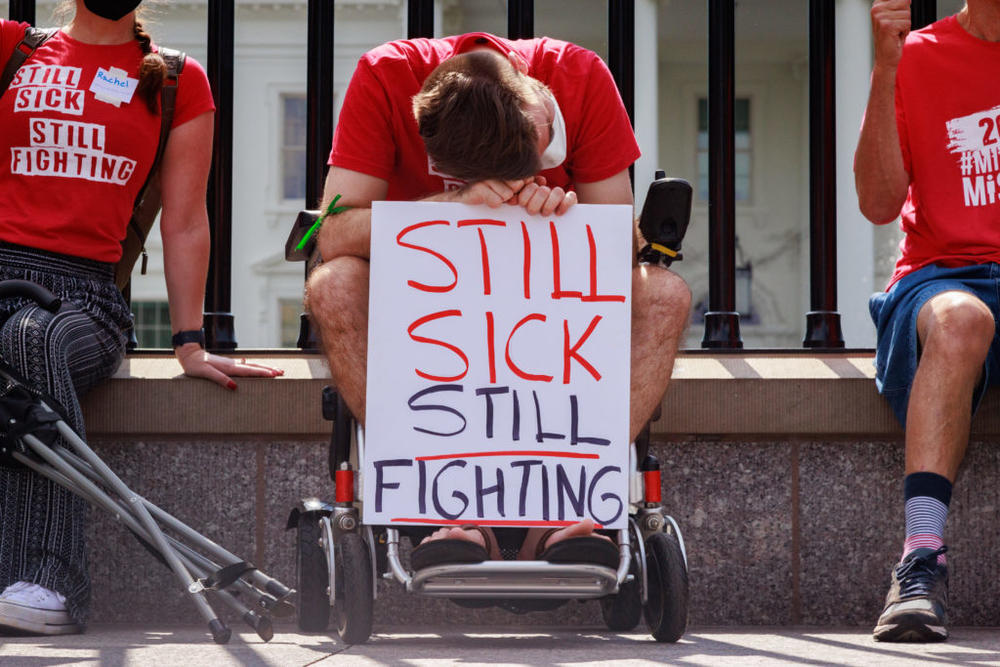 FILE PHOTO: Demonstrators gathered outside the White House in September to protest the nation's response to chronic illness, including long COVID. Photo by Bryan Olin Dozier/NurPhoto