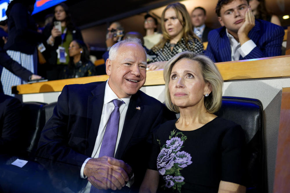 U.S. Democratic vice presidential candidate Minnesota Governor Tim Walz and his wife Gwen Walz attend Day one of the Democratic National Convention (DNC) in Chicago, Illinois, U.S., August 19, 2024. Photo by Cheney Orr/REUTERS