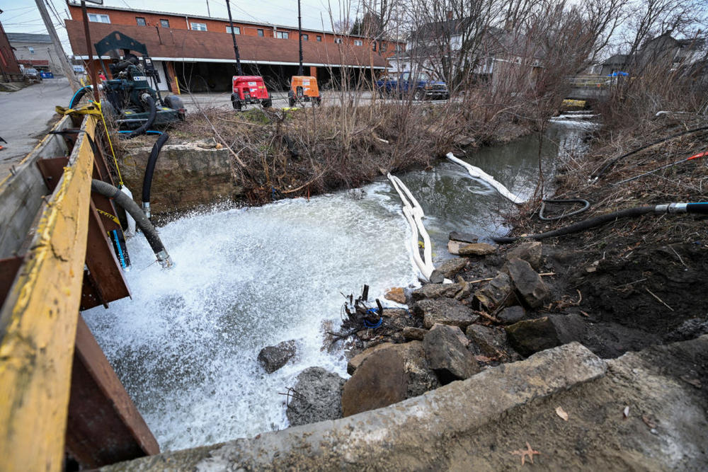 FILE PHOTO: A general view as members of the U.S. Environmental Protection Agency (EPA) (not pictured) inspect the site of a train derailment of hazardous material in East Palestine, Ohio, U.S., February 16, 2023. REUTERS/Alan Freed/File Photo