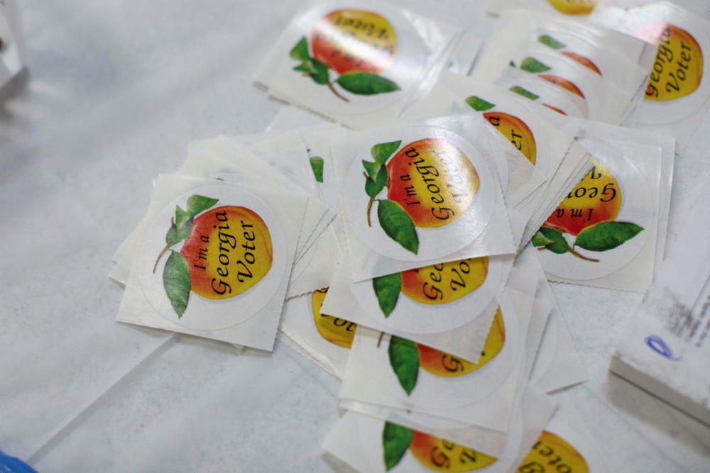 Stickers are available to voters after they cast their ballots at the Chastain Park Gymnasium during the Georgia Primary Election Day in Atlanta, Georgia, U.S. May 24, 2022. REUTERS/Alyssa Pointer
