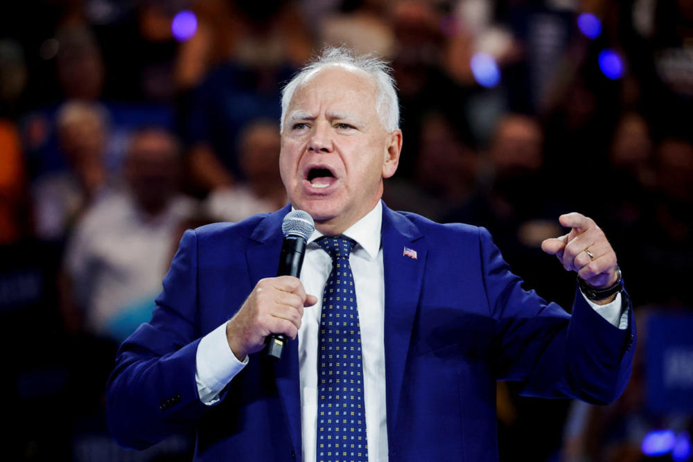 Democratic vice presidential candidate Minnesota Gov. Tim Walz speaks onstage at a campaign rally in Milwaukee, Wisconsin, Aug. 20, 2024. Photo by Marco Bello/Reuters