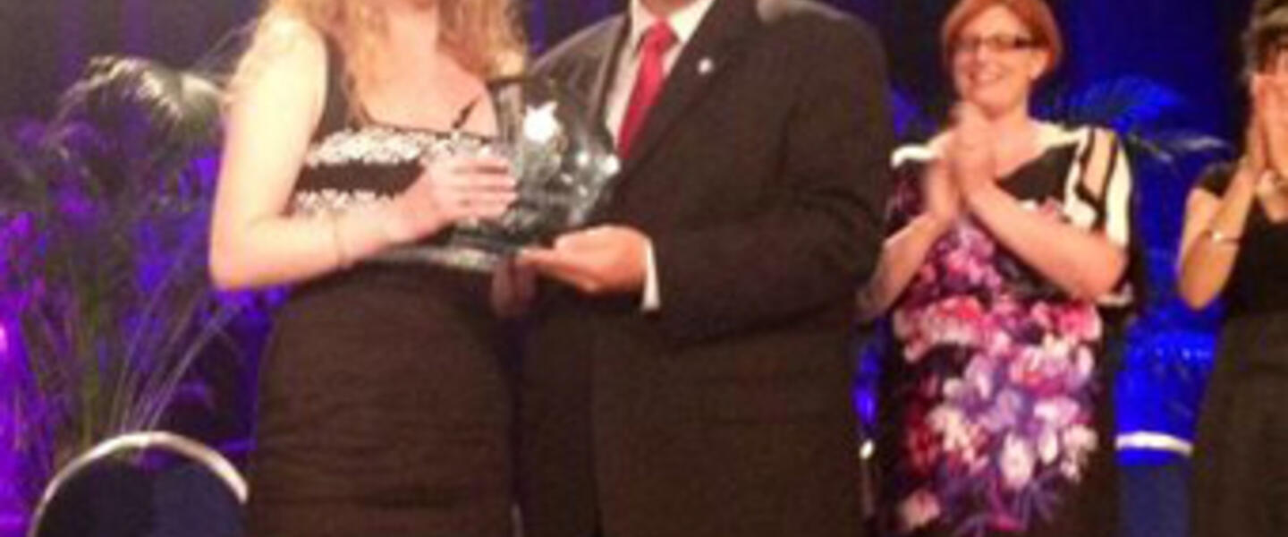 Lauren Eckman (left) receives the Georgia Teacher of the Year award from Superintendent John Barge (Courtesy facebook.com/gadoe Lauren Eckman (left) receives the Georgia Teacher of the Year award from Superintendent John Barge (Courtesy facebook.com/gadoe