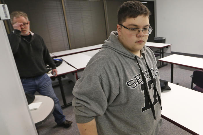 Gloucester County High School senior Gavin Grimm, a transgender student, arrives for a news conference in Richmond, Va., Monday, March 6, 2017. The Supreme Court is handing the Gloucester High School transgender teen's case back to a lower court without reaching a decision. (AP Photo/Steve Helber)