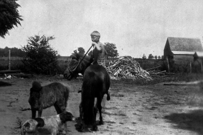 In 1928, the Carter family moved to a 350-acre farm near Plains in the tiny community of Archery, Georgia. The young Carter is pictured here atop his Shetland pony named Lady.