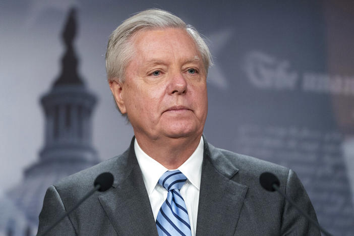 Sen. Lindsey Graham, R-S.C., speaks with reporters about aid to Ukraine, on Capitol Hill, Wednesday, March 10, 2022, in Washington. Attorneys representing Graham said Wednesday, July 6, that he intends to challenge a subpoena compelling him to testify before a special grand jury in Georgia investigating former President Donald Trump and his allies' actions after the 2020 election. 