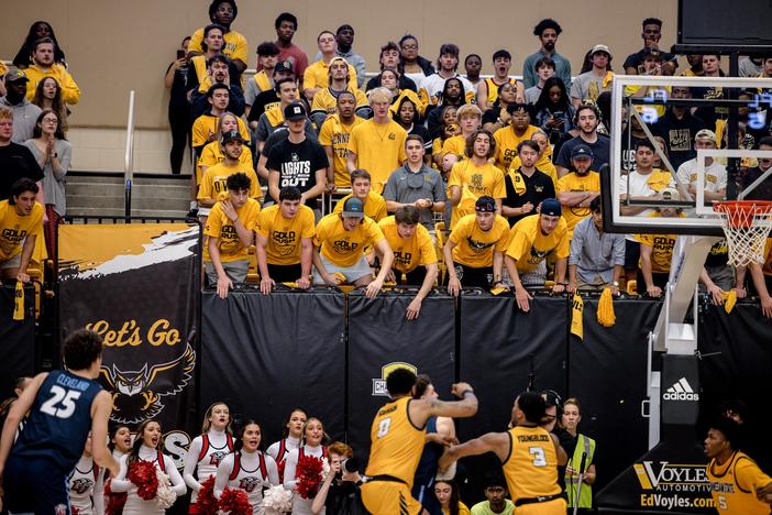 Fans react to the game at the Kennesaw State University Convocation Center.