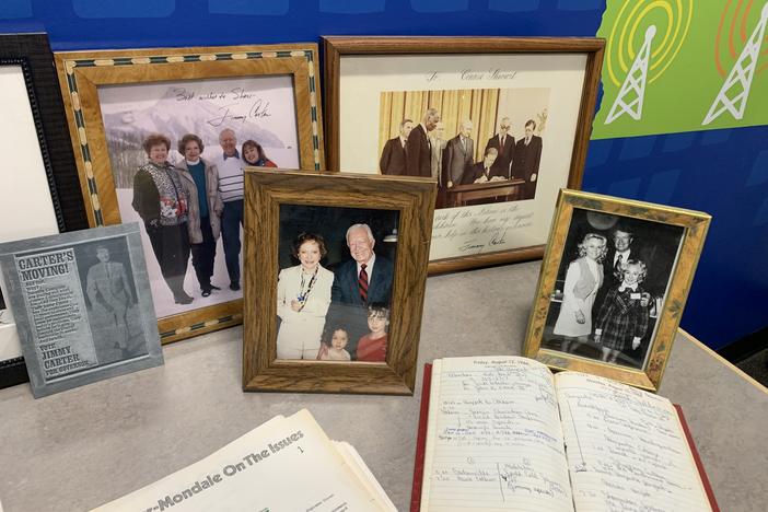 Atlanta actress Sheri Mann Stewart, whose mother Connie Stewart served in Jimmy Carter's administration, is pictured in a display of family memorabilia in April, 2023.