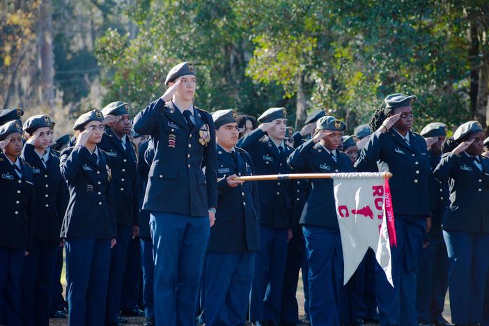 Members of JROTC at Savannah's Windsor Forest High School salute during a memorial for one of there former members, Breonna Moffett, an Army Reservist killed in Jordan in late January.