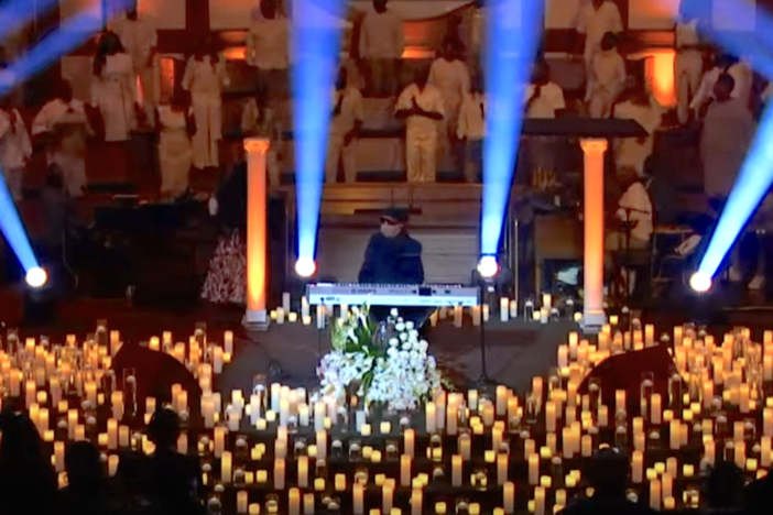 Stevie Wonder performs with the Celebration Choir and organist in a tribute to Dexter Scott King in Atlanta on Feb. 10, 2024