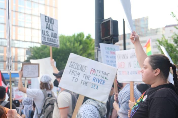 Protestors in support of Palestine rally in midtown Atlanta on June 27, 2024.