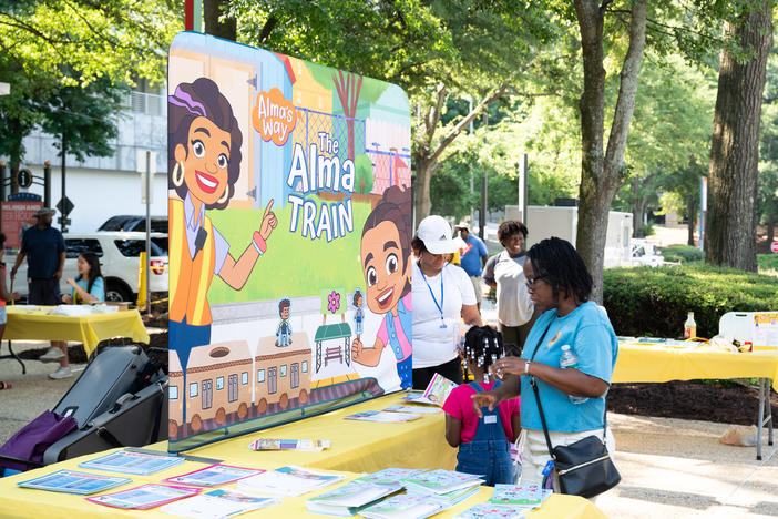 Families explored stations at the Explore Your City with Alma's Way event on July 13. 