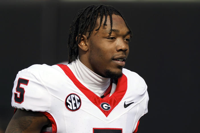 Georgia wide receiver Rara Thomas (5) warms up before an NCAA college football game against Vanderbilt, Saturday, Oct. 14, 2023, in Nashville, Tenn. Thomas was arrested on charges of cruelty to children and battery early Friday, July 26, 2024, in Athens, Ga., adding to the team's recent legal woes.