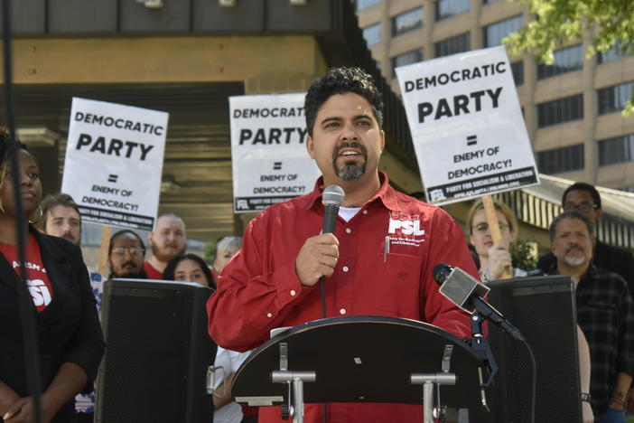 Claudia De la Cruz campaign volunteer Estevan Hernandez speaks at a Party for Socialism and Liberation press conference opposing the Democratic Party of Georgia’s legal challenges against third-party presidential candidates. Ross Williams/Georgia Recorder