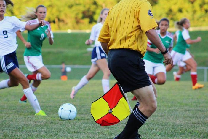 Girl soccer team playing. (Pexels)