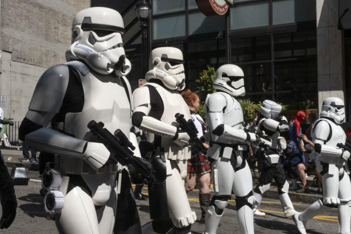 Storm Troopers walk in the 2024 Dragon Con parade on Saturday, August 31, 2024.