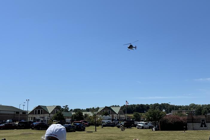 A Life Flight air medical ambulance seen leaving the scene of the Apalachee High School campus. Chase McGee/GPB News