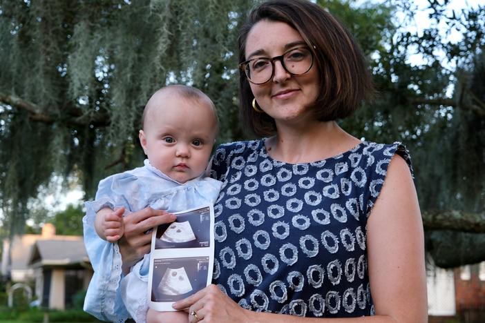 Callie Beale and her daughter Kit pose for a portrait near their home in Savannah.