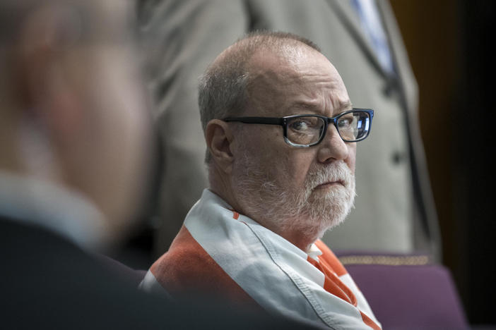 Greg McMichael sits with his attorney before a hearing challenging his conviction of killing Ahmaud Arbery in 2020, Thursday, Oct. 24, 2024, in Brunswick, Ga.